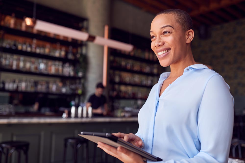 Franchisee in business preparing for her day.